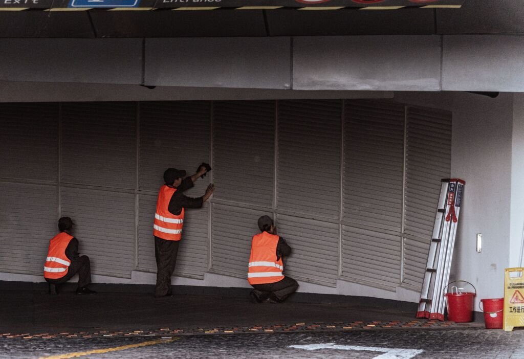 Technical team performing facility management and maintenance work in a commercial building