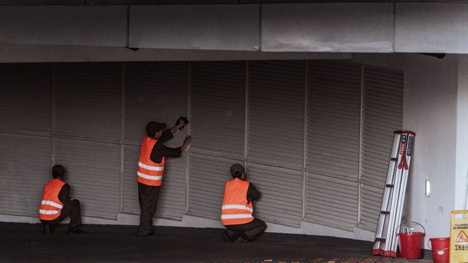 Technical team performing facility management and maintenance work in a commercial building