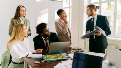 Business professionals collaborating during a corporate support services meeting