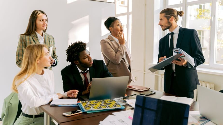 Business professionals collaborating during a corporate support services meeting