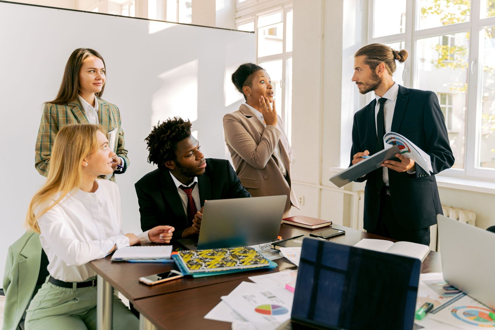 Business professionals collaborating during a corporate support services meeting